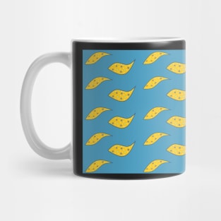 Yellow paisley fish on blue background Mug